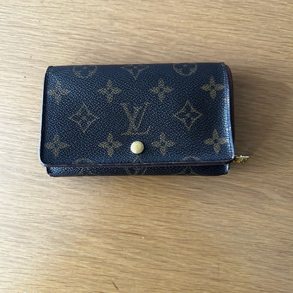 Louis Vuitton bi-fold wallet with zip coin